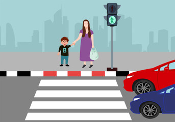 Mom and kid crosswalk by A crosswalk is a marked walkway across a road or street. Crosswalks make it safer for pedestrians to cross the street. © pasakorn