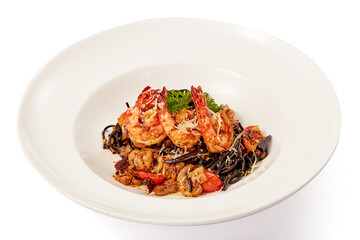 Black squid pasta stir fried with tiger shrimp and dried chilli (Thai Style) in white plate isolated on white background.