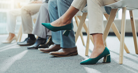 Closeup, business people and shoes with feet, job interview waiting room and nervous with opportunity. Row, group and candidates with recruitment with heels, footwear and hiring in a workplace - obrazy, fototapety, plakaty