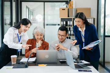 Young business creative team are brainstorming planning discussing while sitting in office