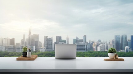 a laptop on a table with a city skyline in the background