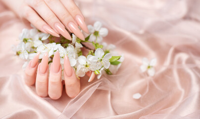 Fototapeta premium Elegant pastel pink natural manicure.