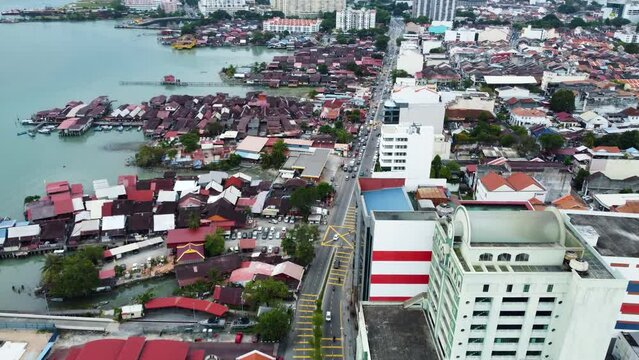 Connected by walkways of wooden planks, Clan Jetties, Georgetown. Aerial