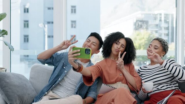 Selfie, friends and peace sign on couch in a office with social group taking a profile picture. Startup, young people and business staff with photo for social media app with team emoji hand sign