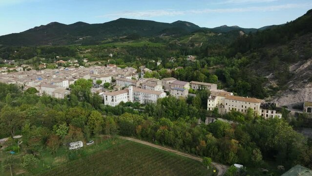 Aerial over village of Saillans, overlooking the Col de Blancheville, river Dr&ocirc;me. Located in the Dr&ocirc;me department, in the Auvergne-Rh&ocirc;ne-Alpes region, France.
