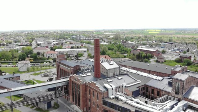 Aerial Approach Towards Old Sugar Factory Turned Hotel In Historical Centre Of Znin In Poland.