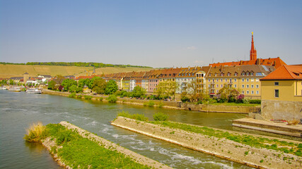 Cityscape of Würzburg historical downtown, old city and center, Bavaria, Germany, at sunset warm colors. River Main.