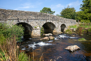 Fototapeta na wymiar Postbridge Dartmoor road bridge