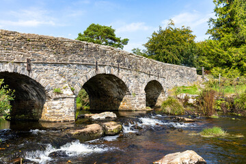 Fototapeta na wymiar Postbridge Dartmoor road bridge England