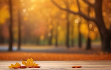 Naklejka na ściany i meble Empty wooden table with autumn background. Wooden table and autumn leaves on abstract bokeh fall background