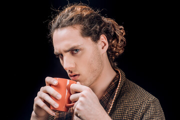 Handsome man holds cup of coffee. Morning tea. Good morning. Man with tea cup. Hipster man with cup of coffee. Bearded man smiling hold mug tea. Wake up. Happy day. After morning tea.