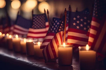 Fotobehang An American flag gently draped over a row of memorial candles with a warm glow on Patriot Day © KerXing