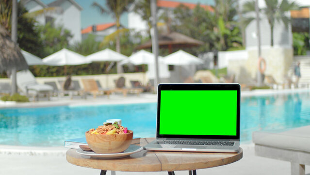 Chroma key display close up. Green screen mock up. Palm tree work cafe. Use clean computer macbook. Clear web site copy space. Blank place view. Laptop desk workspace. No man area. Rest relax day trip - Powered by Adobe