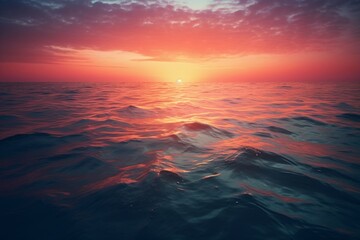 Serene water surface capturing the colors of dawn