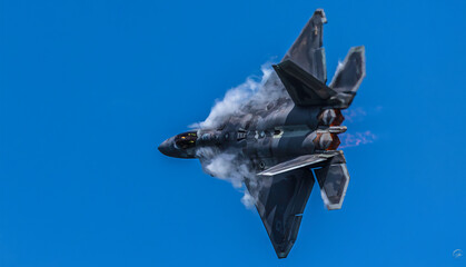 F22 Raptor with vapor and afterburner