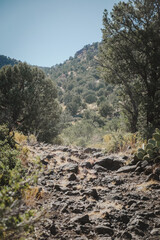 Fototapeta na wymiar Volcanic rocky ATV trail in mountainous desert landscape in Camp Verde Arizona
