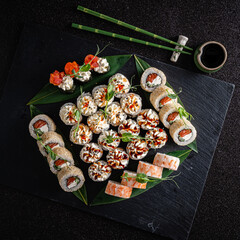 sushi on the black background