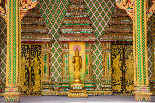 Sculpture ancient ordination hall and carving antique ubosot for thai people travel visit and respect praying blessing wish buddha holy mystery at Wat Saen Suk or Saen Suk temple in Ang Thong Thailand