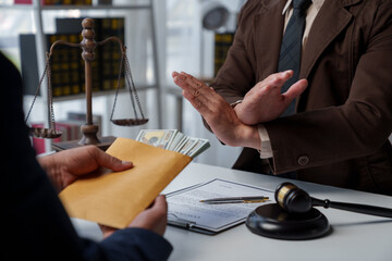 Businessman or accountant is rejecting and resisting partner bribery deals in joint financial...