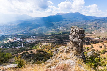 Mysterious mountain landscape of the Valley of Ghosts, a cluster of strangely shaped rocks on the western slope of Mount Demerdzhi in Crimea
