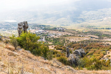 Mysterious mountain landscape of the Valley of Ghosts on the western slope of Mount Demerdzhi in Crimea. Popular tourism and trekking destination
