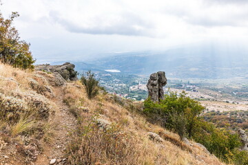 Mysterious mountain landscape of the Valley of Ghosts, a cluster of strangely shaped rocks on the western slope of Mount Demerdzhi in Crimea