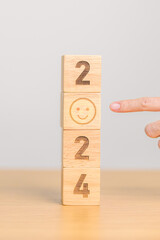 Smile face with 2024 block.  Satisfaction, feedback, Review, mental health, eco sustainable and...