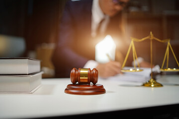 Judge gavel with Justice lawyers having team Concepts of Law and Legal services