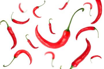 Fotobehang Falling red hot chili peppers on transparent background png © Nofi