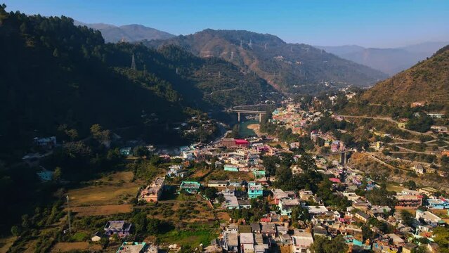 Aerial view of Srinagar city in Pauri Garhwal, the Indian state of Uttarakhand. located at the bank of Alaknanda river, 4K Indian city Drone shot.