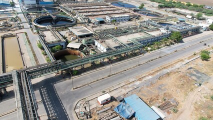 Chemical energy industry site power manufacturing factory pipe gas line top drone view smoke air...