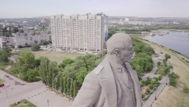 Aerial shot close fast orbit of Lenin Monument, Volgograd, Russia.