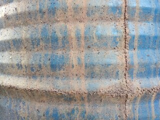 corrosion on metal surfaces that have been painted blue