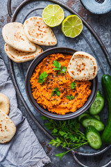 Homemade vegan Harissa carror and lentil spread with flatbread