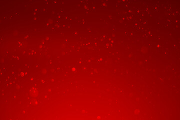 red glitter vintage lights background. red bokeh shiny on dark background.