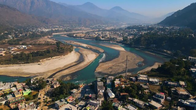 Aerial view of Srinagar city in Pauri Garhwal, the Indian state of Uttarakhand. located at the bank of Alaknanda river, 4K Indian city Drone shot.