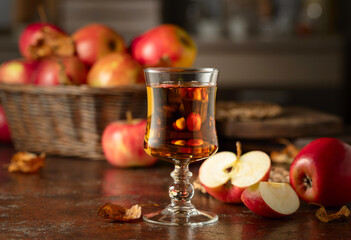 Apple juice on an old kitchen table.