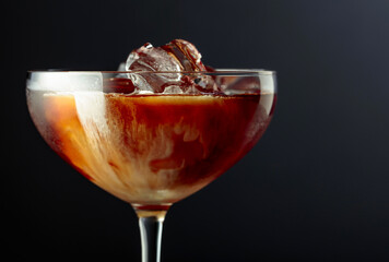 Iced coffee with ice and cream.