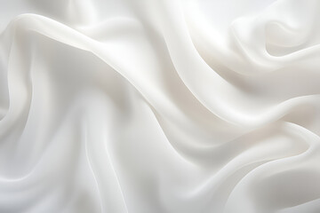 Obraz premium white fabric lies in soft waves as a background, top view. material.