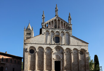 Obraz premium The Cathedral of Saint Cerbonius with Bell tower at the Garibaldi square in Massa Marittima. Italy