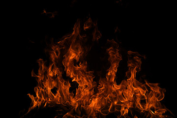 Flame fires. Burn lights on a black background. Fire flames on black background. Abstract fire...