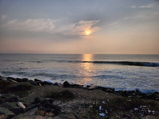 Puducherry, India - Oct 17 2023: Sun rise at Rock Beach in Pondicherry.