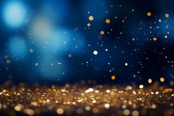 Fototapeta na wymiar Golden abstract bokeh on blue background. Celebrating Christmas, New Year or other holidays.