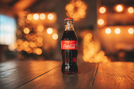 MOSCOW, RUSSIA- DECEMBER, 2022: bottle of Coca-Cola at Christmas background