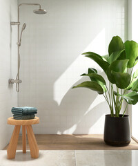 Shower enclosure in bathroom with chair, towel, rain shower, green tropical tree in sunlight in...