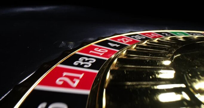 Fortune wheel roulette with money bets in casino. Betting on tablecloth numbers in secret casino. Obsession with illegal gambling games