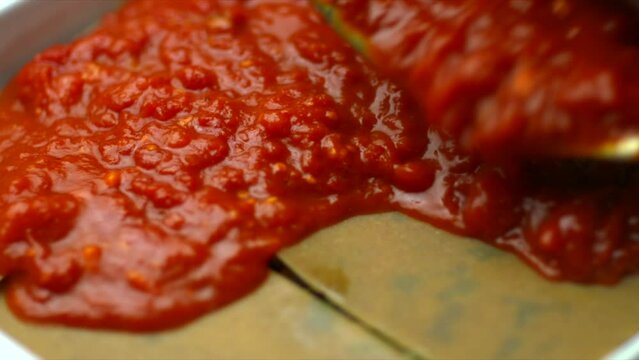 Lasagna cooking. Plant-based recipe of vegetarian and vegan pasta cooking. Shallow depth of field footage of lasange being prepped.