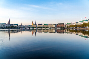 Reflection of buildings at Binnenalster lake, Hamburg, Germany
