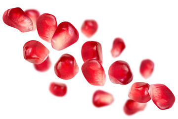 Levitation of pomegranate seeds isolated on transparent background.