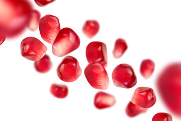 Levitation of pomegranate seeds isolated on transparent background.